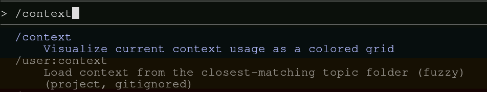 Claude Code showing /context and /user:context slash commands.